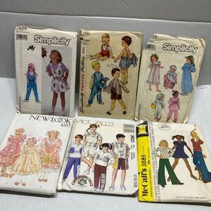 ^ children’s sewing pattern Collection 6 patterns cut toddler & child sizes